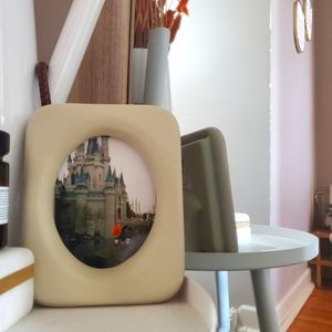 Ceramic beige freestanding photo frame with retro Disneyland castle